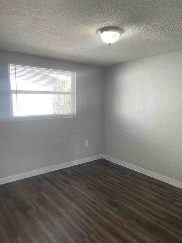 415 12th St W - Photo 7 of 9