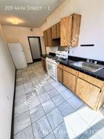 featured image of 209 44th St #1