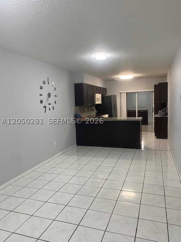 2390 W 74th St #202 - Photo 5 of 18