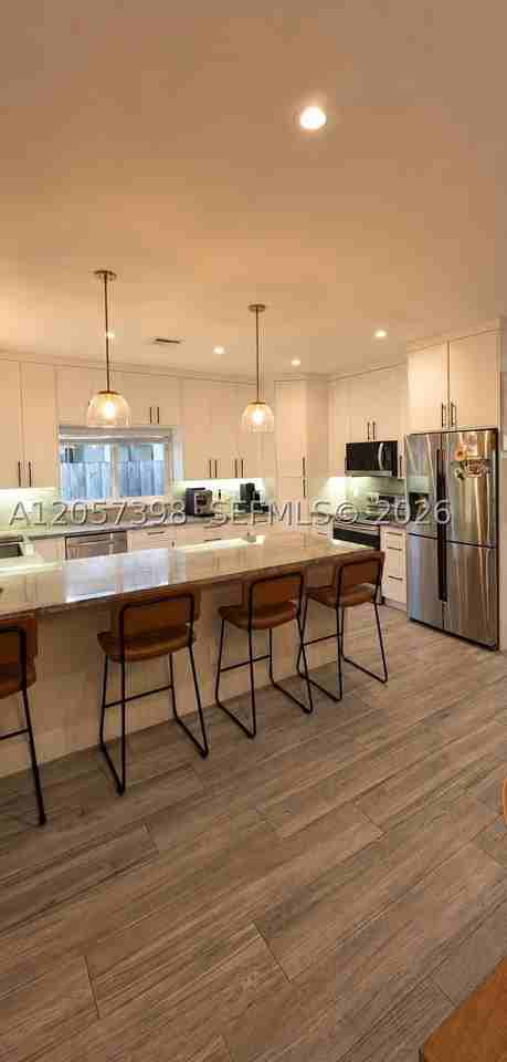 6958 Park St - Photo 5 of 18