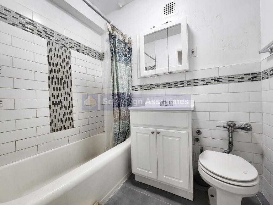 210 W 251st St - Photo 7 of 9