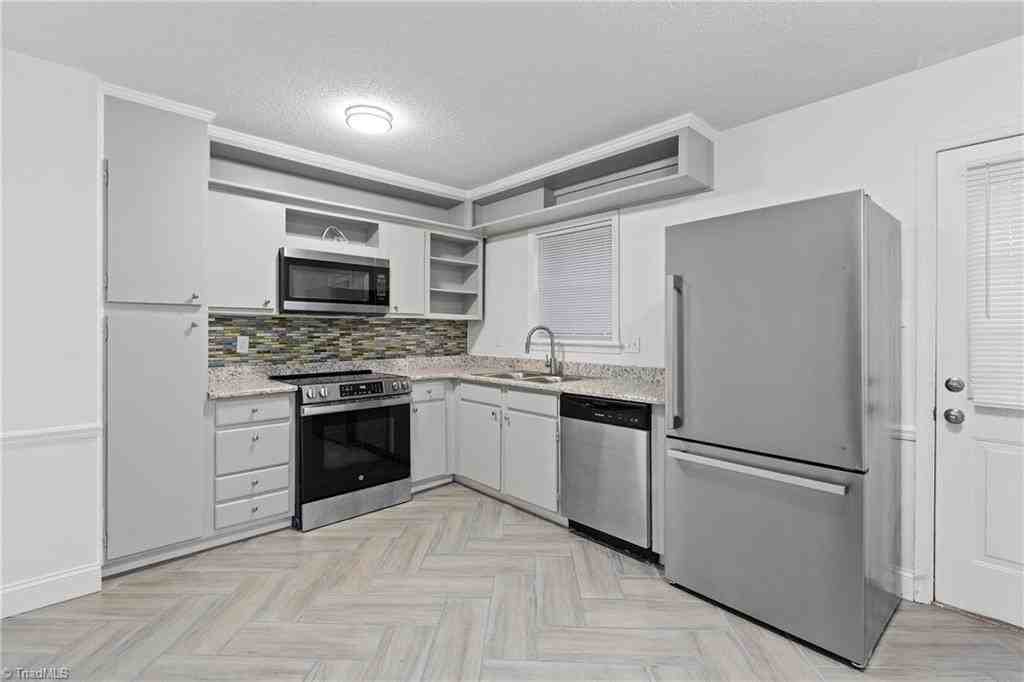 1303 W Meadowview Rd #F - Photo 2 of 2