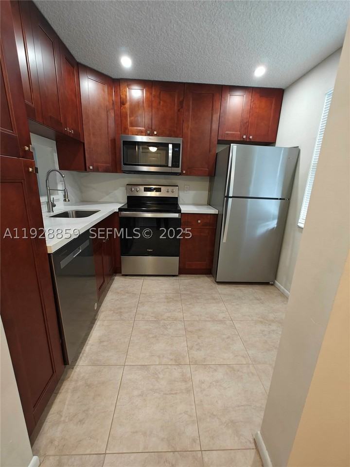 8770 Royal Palm Blvd #203-2 - Photo 7 of 42