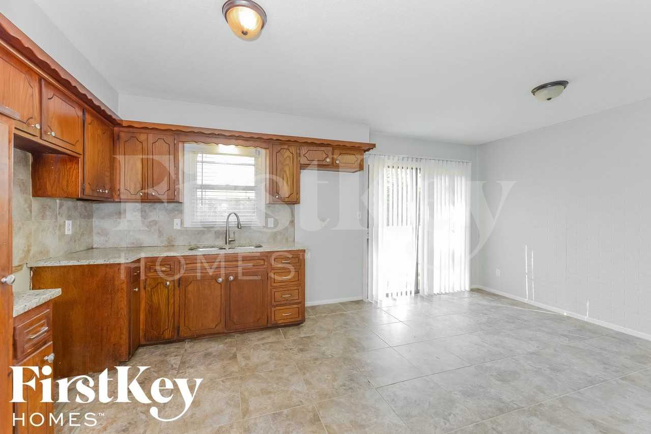 8913 E 90th Ter - Photo 6 of 15
