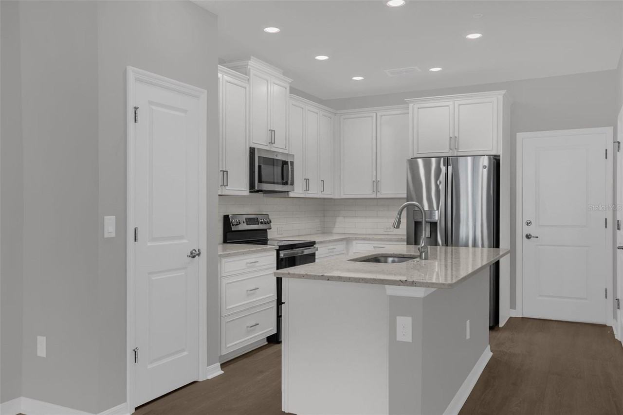 8629 Tavistock Lakes Blvd - Photo 6 of 37