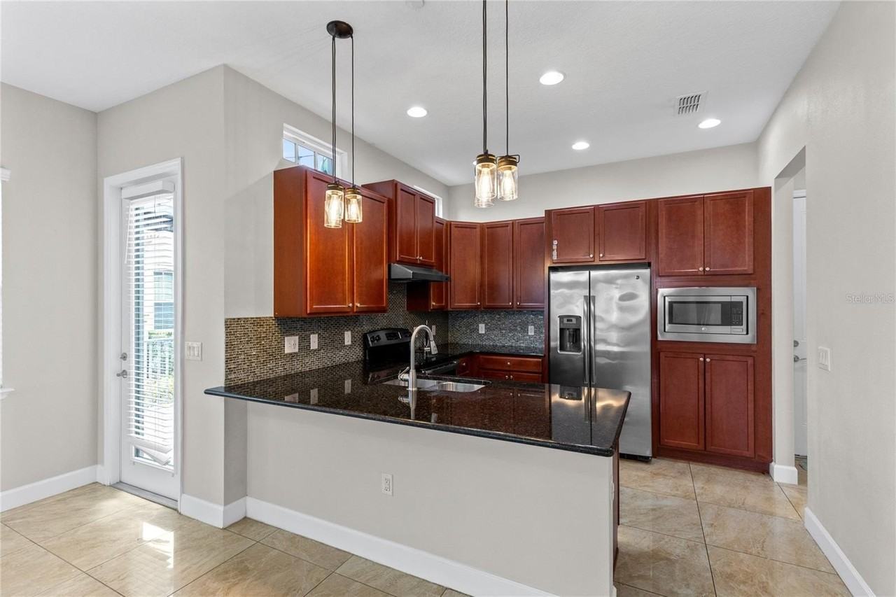 13775 Benavente Ave - Photo 7 of 34