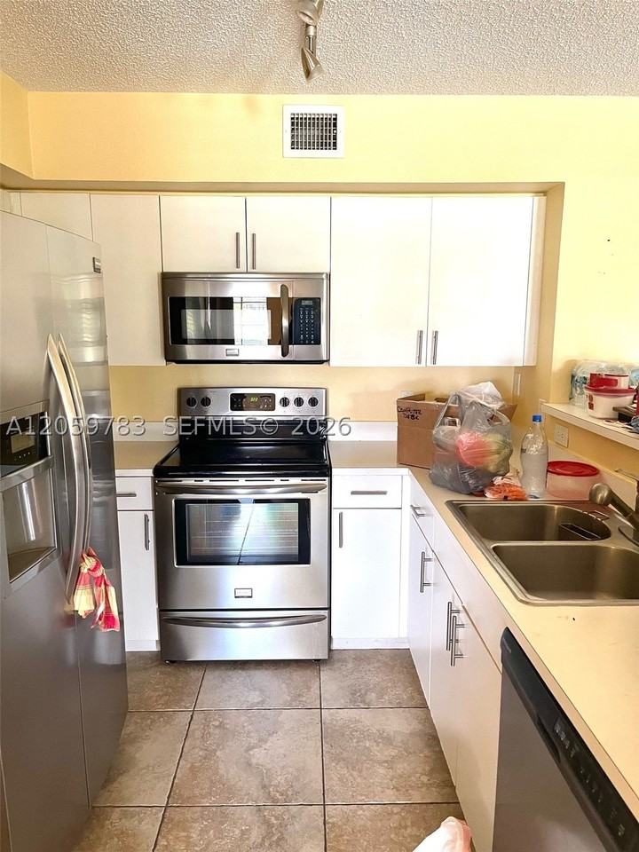 4540 Nw 107th Ave #308-11 - Photo 5 of 16
