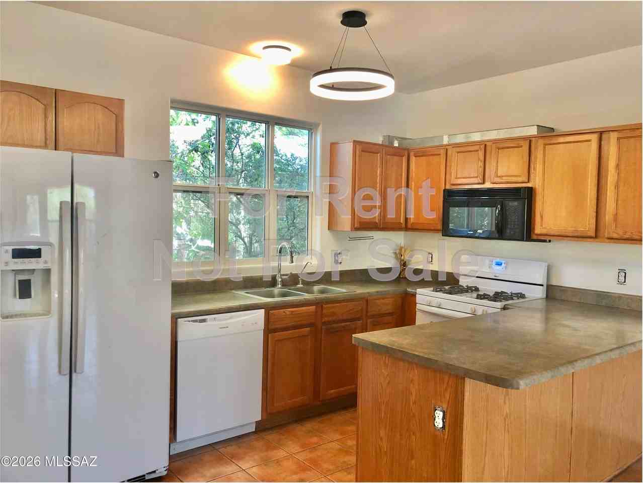 575 E Roger Rd - Photo 3 of 17