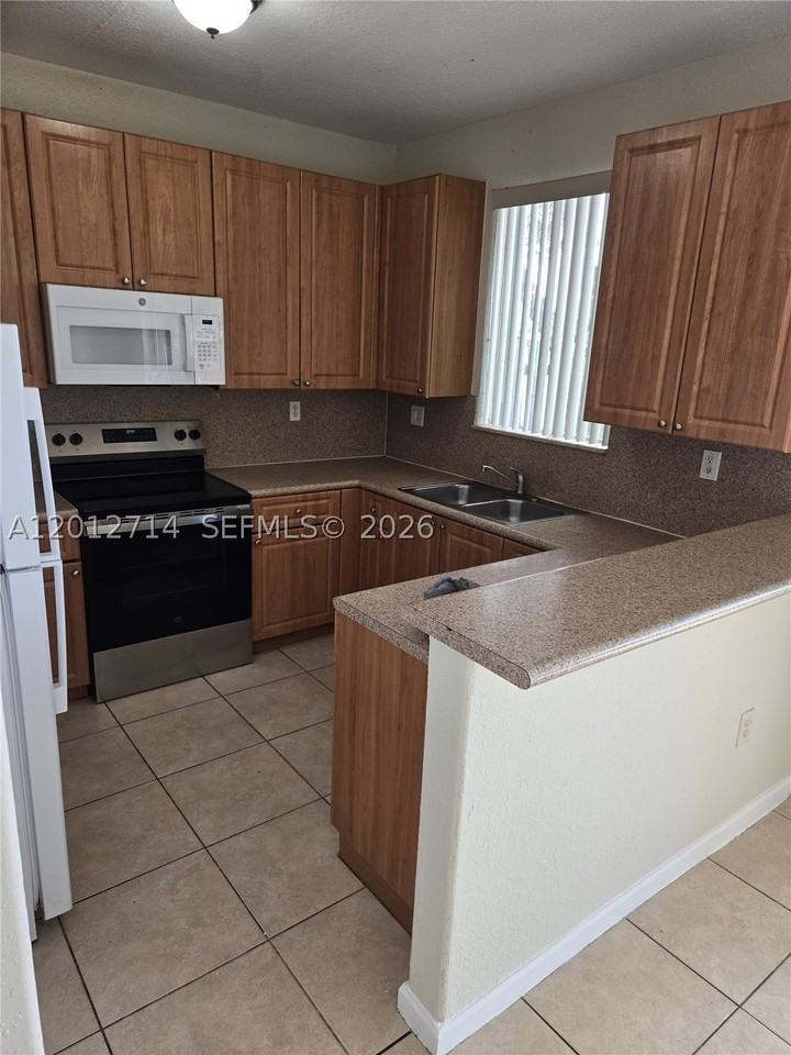 1442 Se 24th Ct #358 - Photo 3 of 25