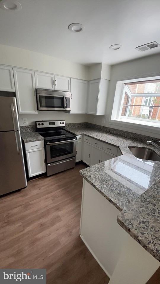 2602 S Arlington Mill Dr Apt E - Photo 5 of 25