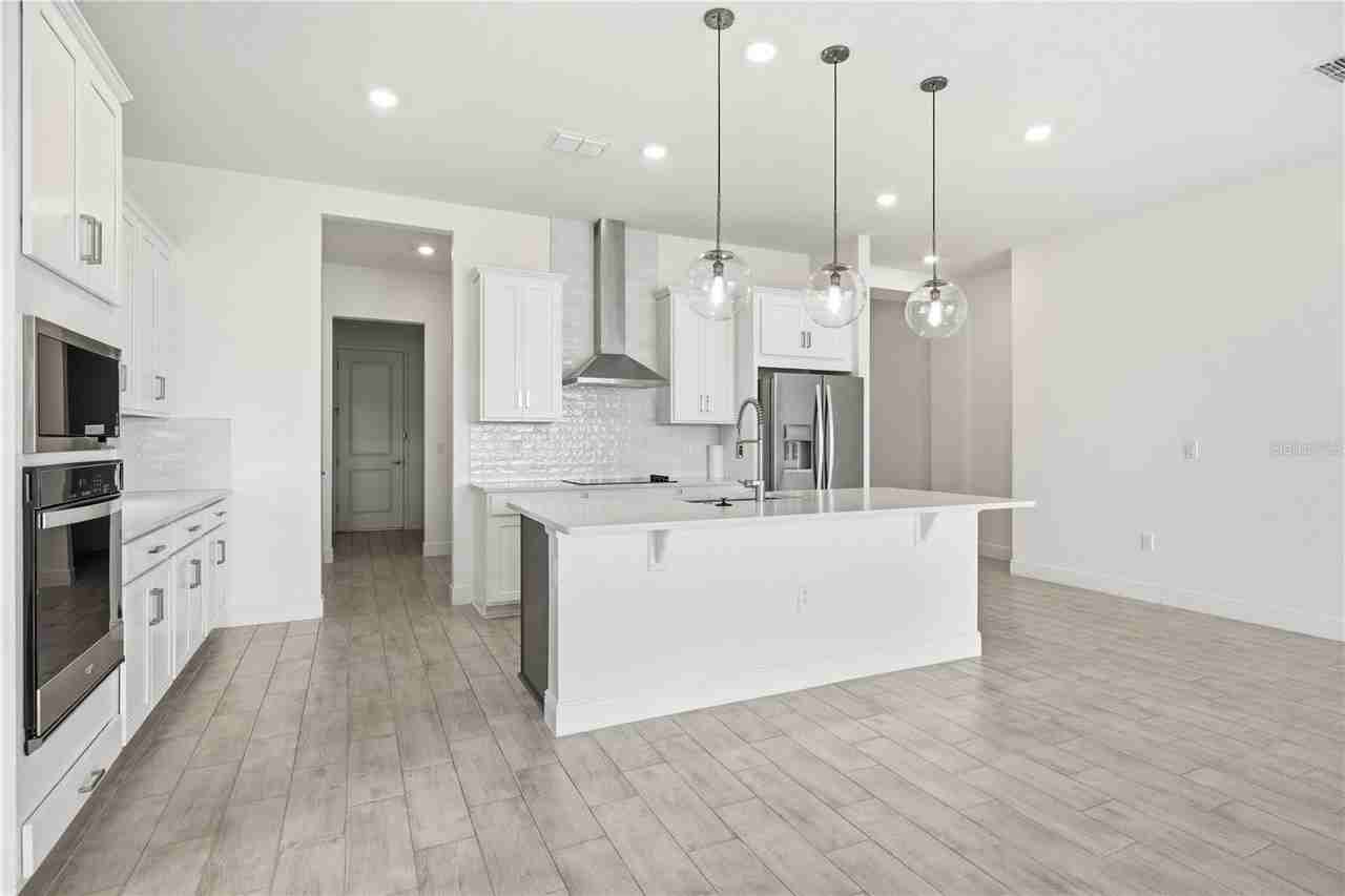 13589 Mcmillan Dr - Photo 5 of 37