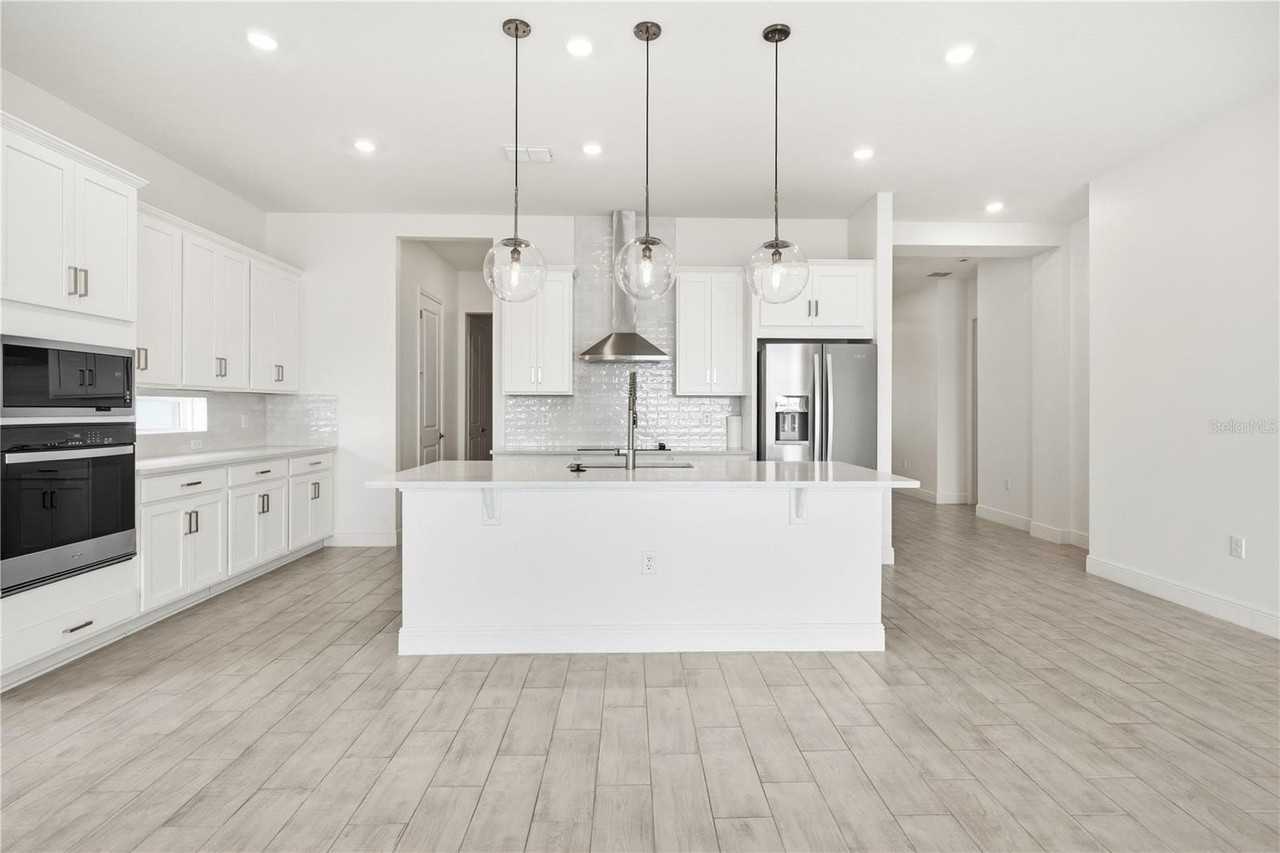 13589 Mcmillan Dr - Photo 4 of 37