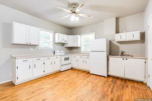 featured image of 127 W 6th St