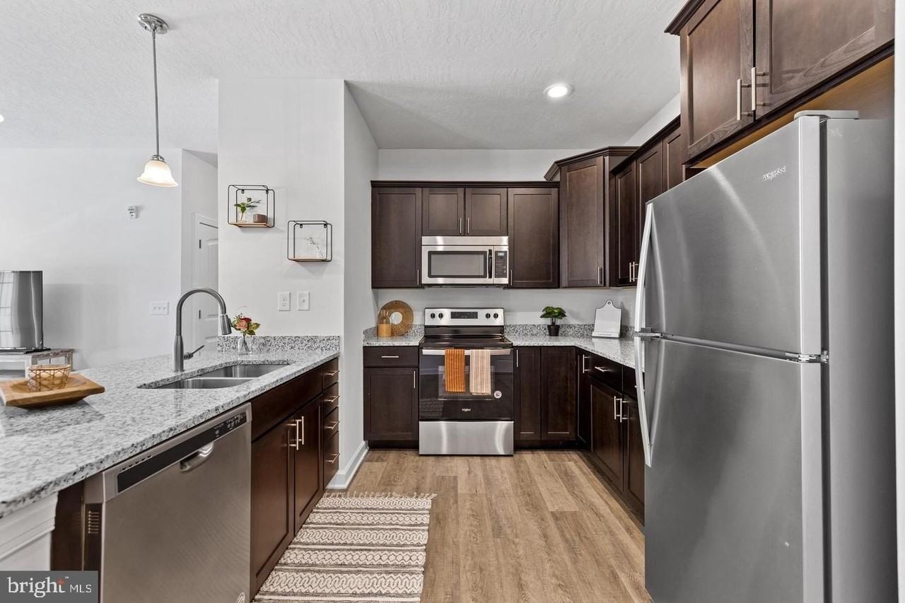 980 Setting Sun Ln #07-203 - Photo 3 of 18