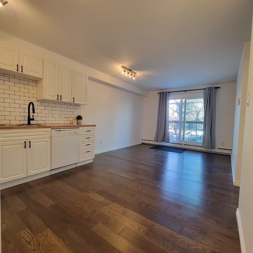 1613 11 Ave Sw - Photo 2 of 9