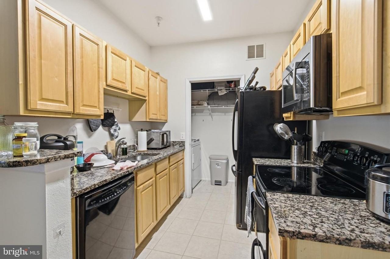 1591 Spring Gate Dr - Photo 3 of 26