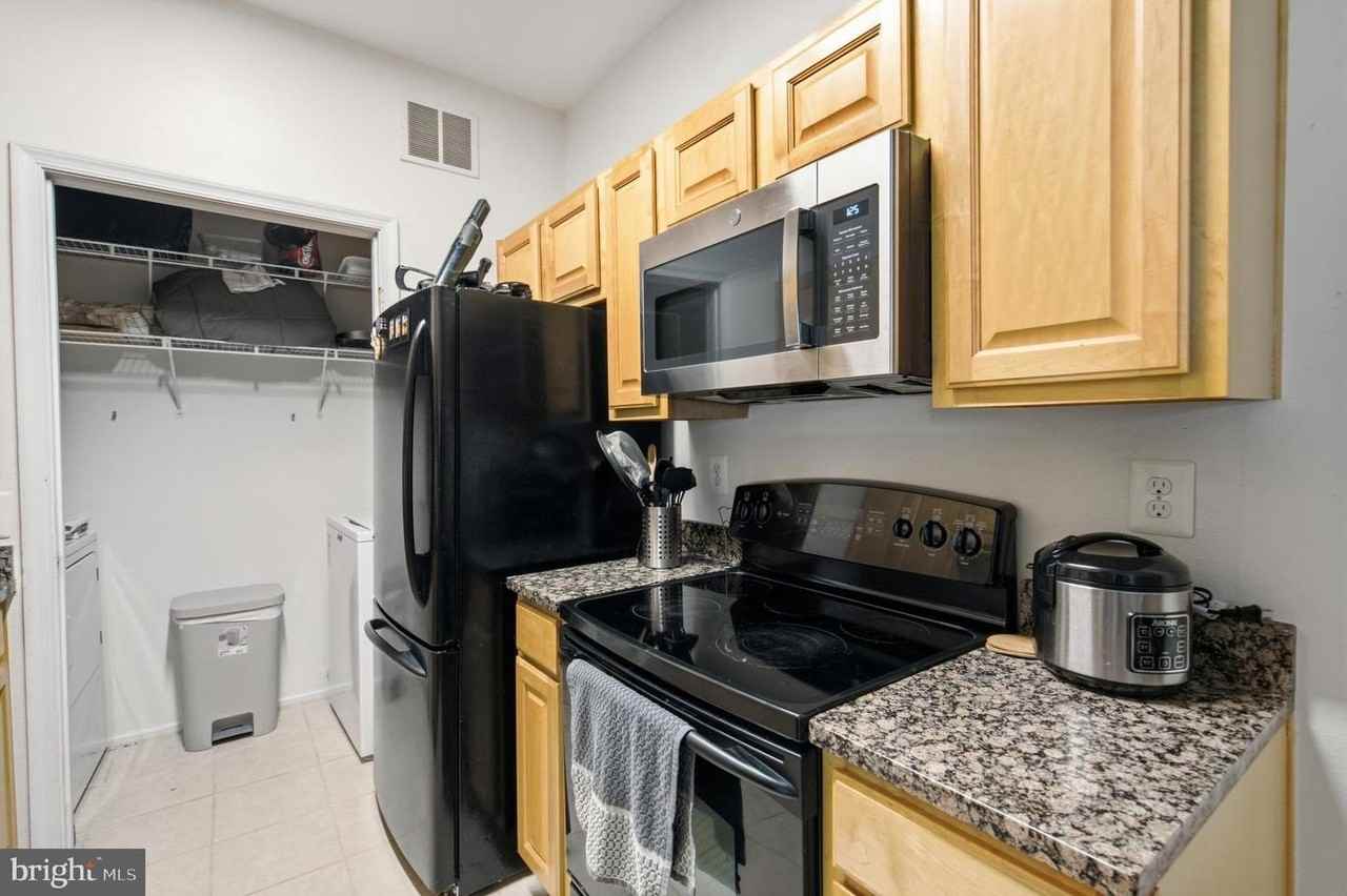 1591 Spring Gate Dr - Photo 4 of 26