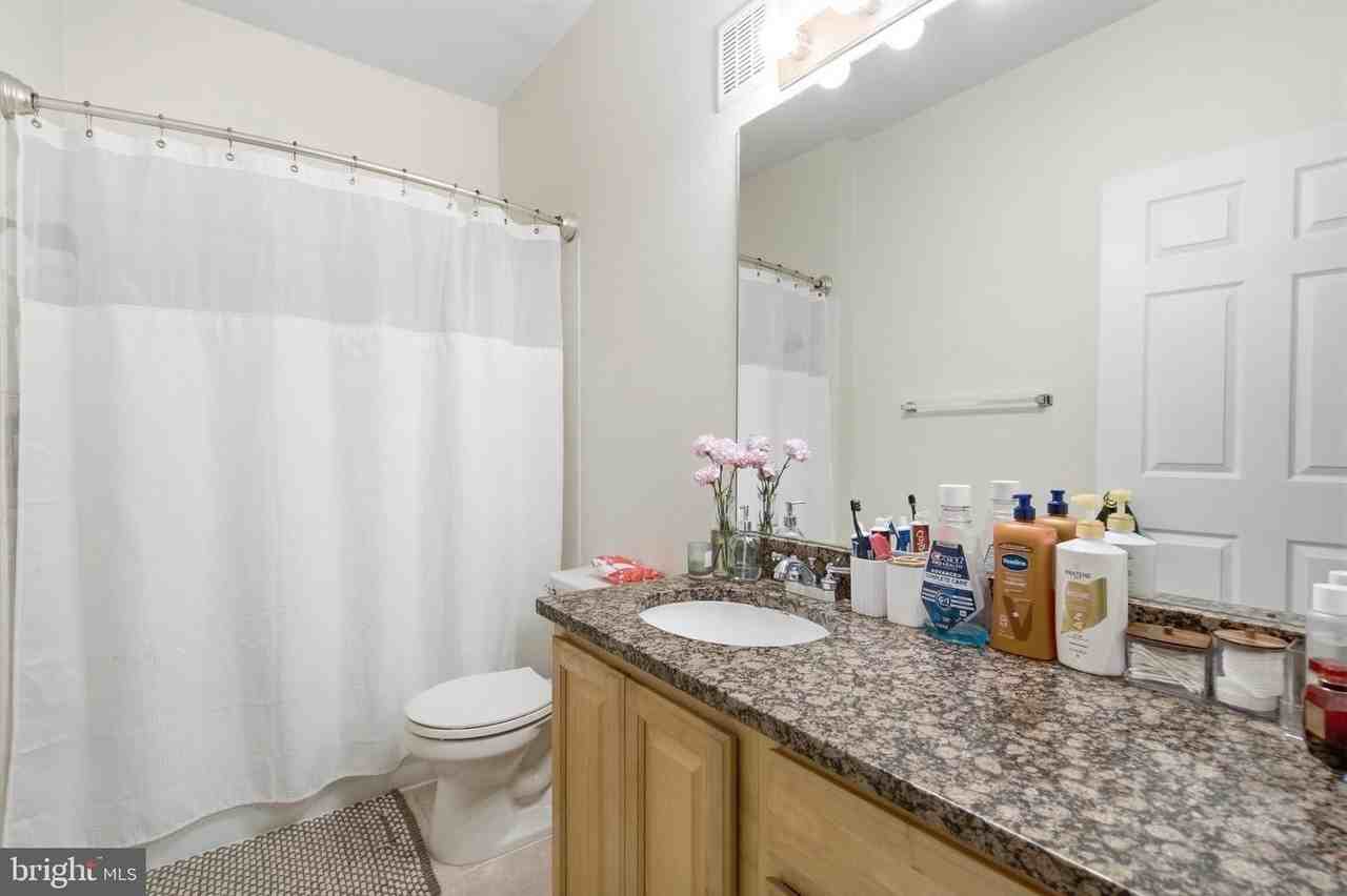 1591 Spring Gate Dr - Photo 6 of 26