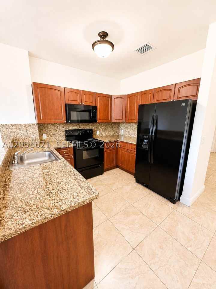 18100 Nw 59th Ave #205 - Photo 4 of 10