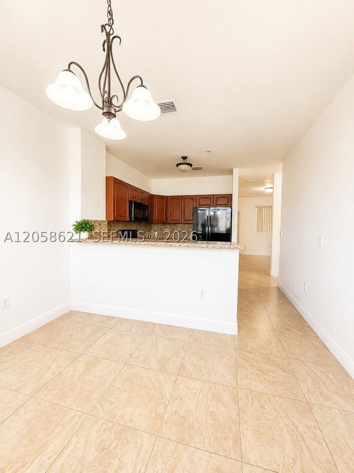 18100 Nw 59th Ave #205 - Photo 5 of 10