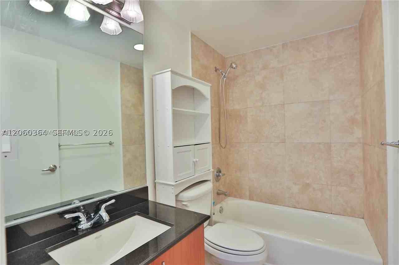 7501 E Treasure Dr #4K - Photo 2 of 11