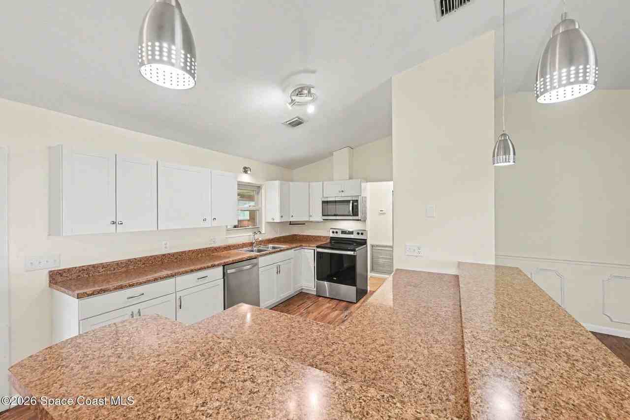 1242 Laconia St - Photo 6 of 18
