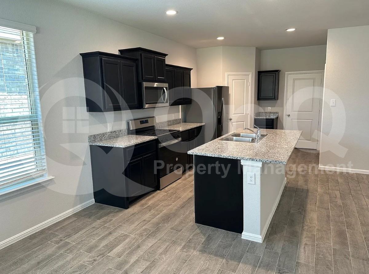 8613 Wildwest Dr - Photo 3 of 15