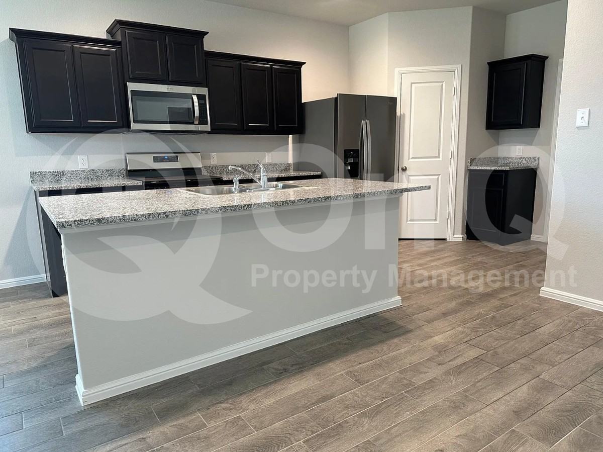8613 Wildwest Dr - Photo 4 of 15