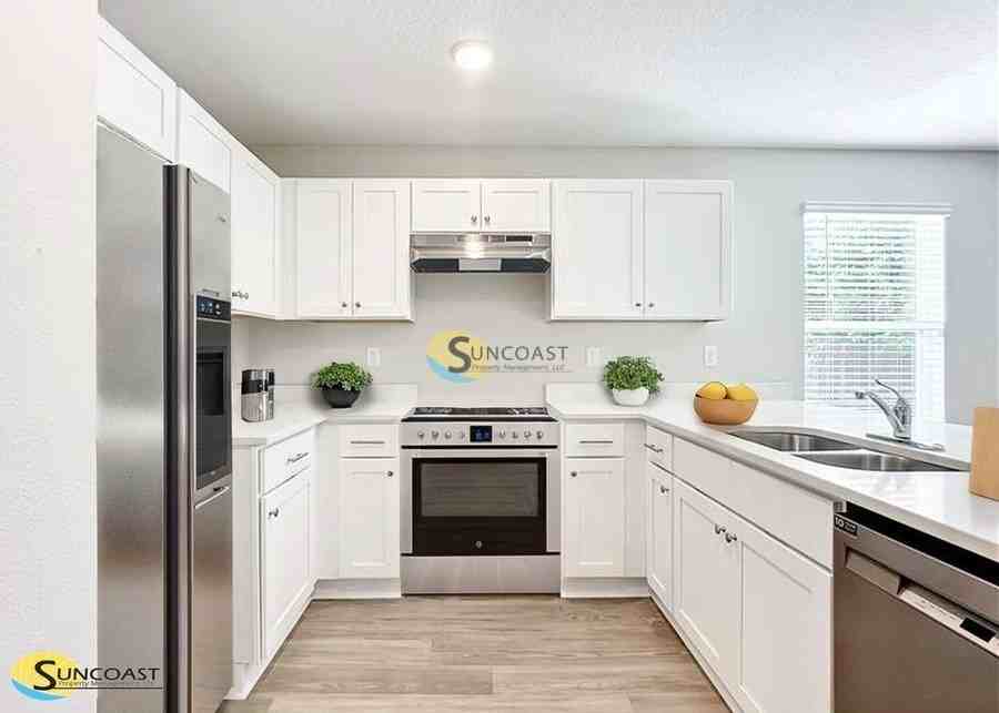 6475 Breezy Oaks Way #202 - Photo 2 of 32