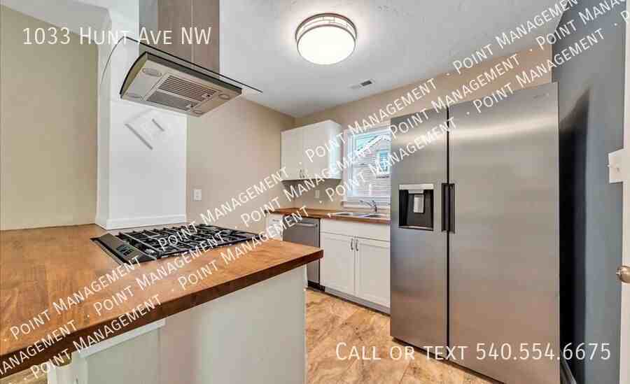 1033 Hunt Ave Nw - Photo 3 of 7