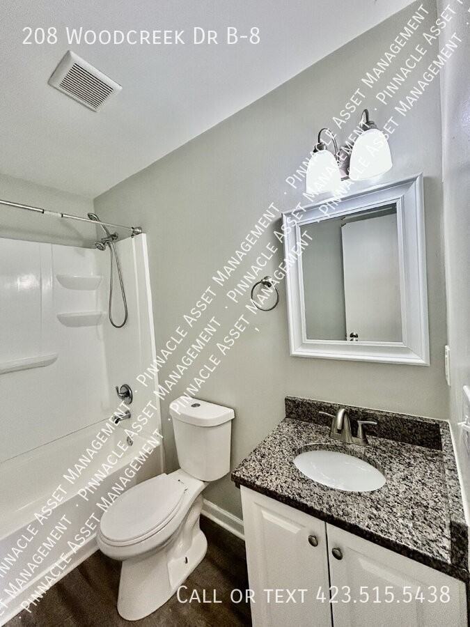 208 Woodcreek Dr - Photo 5 of 30