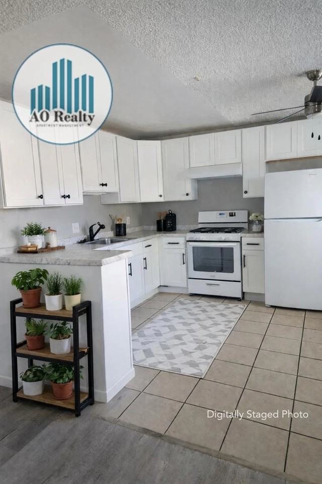 McDouall Apartments - Photo 3 of 39