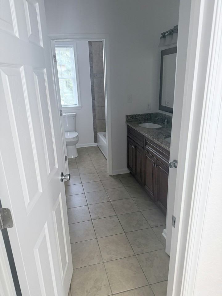 213 W 30th St - Photo 6 of 10