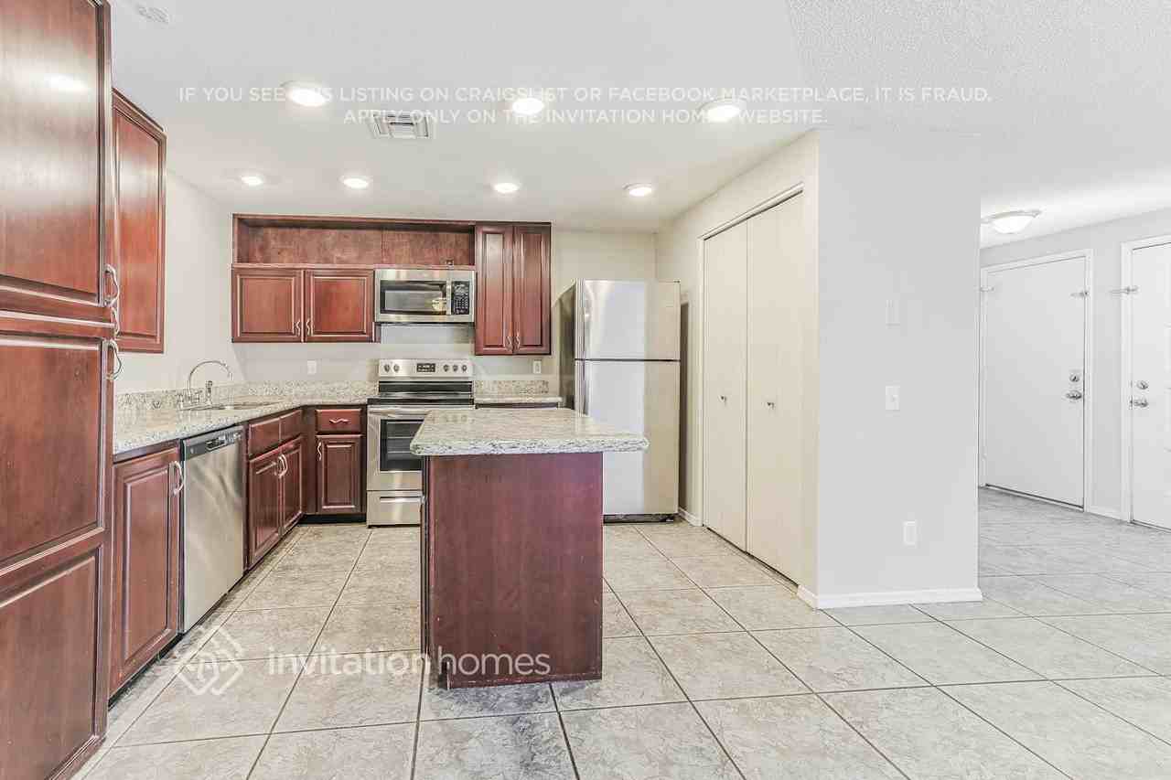 1616 W Los Arboles Pl - Photo 7 of 16