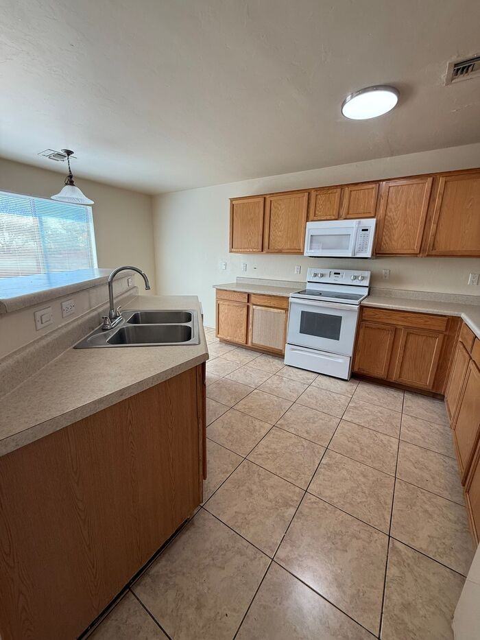 6812 S Sonoran Bloom Ave - Photo 6 of 32