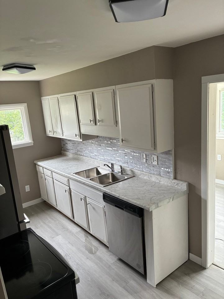 409 N 77th Ave W - Photo 3 of 14