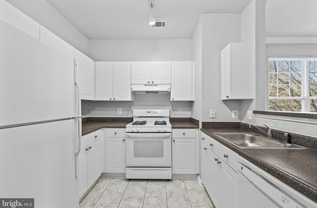 11305 Aristotle Dr #205 - Photo 7 of 14