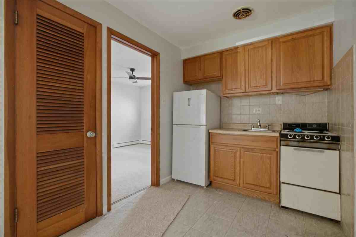 6250 W 64th Pl #101 - Photo 2 of 12