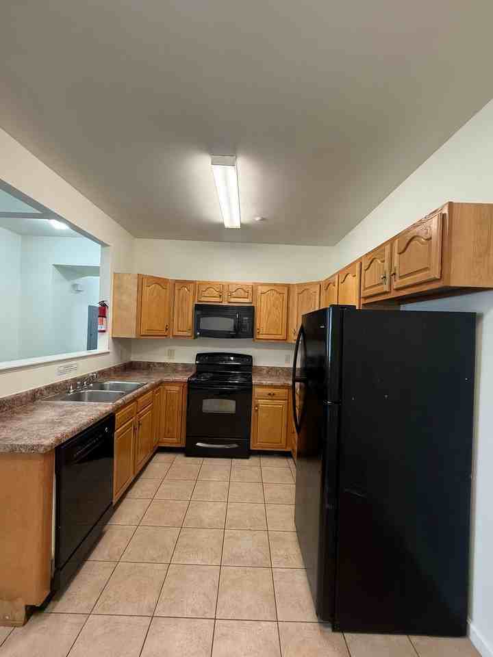Maverick Apartments! - Photo 4 of 16