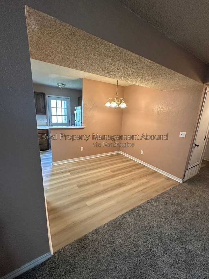8011 N 117th East Ave - Photo 5 of 13