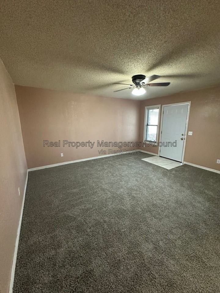 8011 N 117th East Ave - Photo 6 of 13