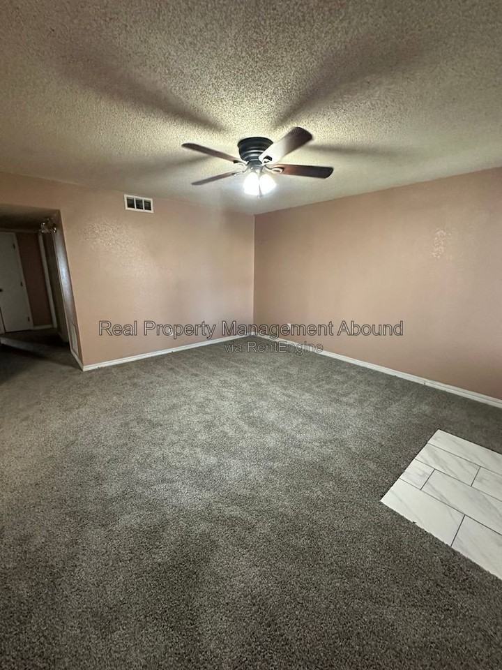 8011 N 117th East Ave - Photo 7 of 13