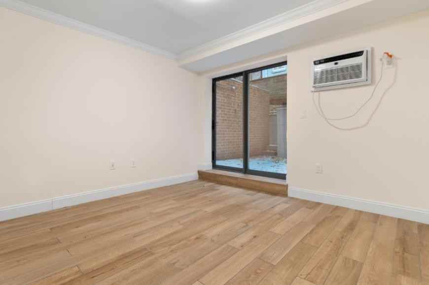 210 E 22nd St - Photo 3 of 10