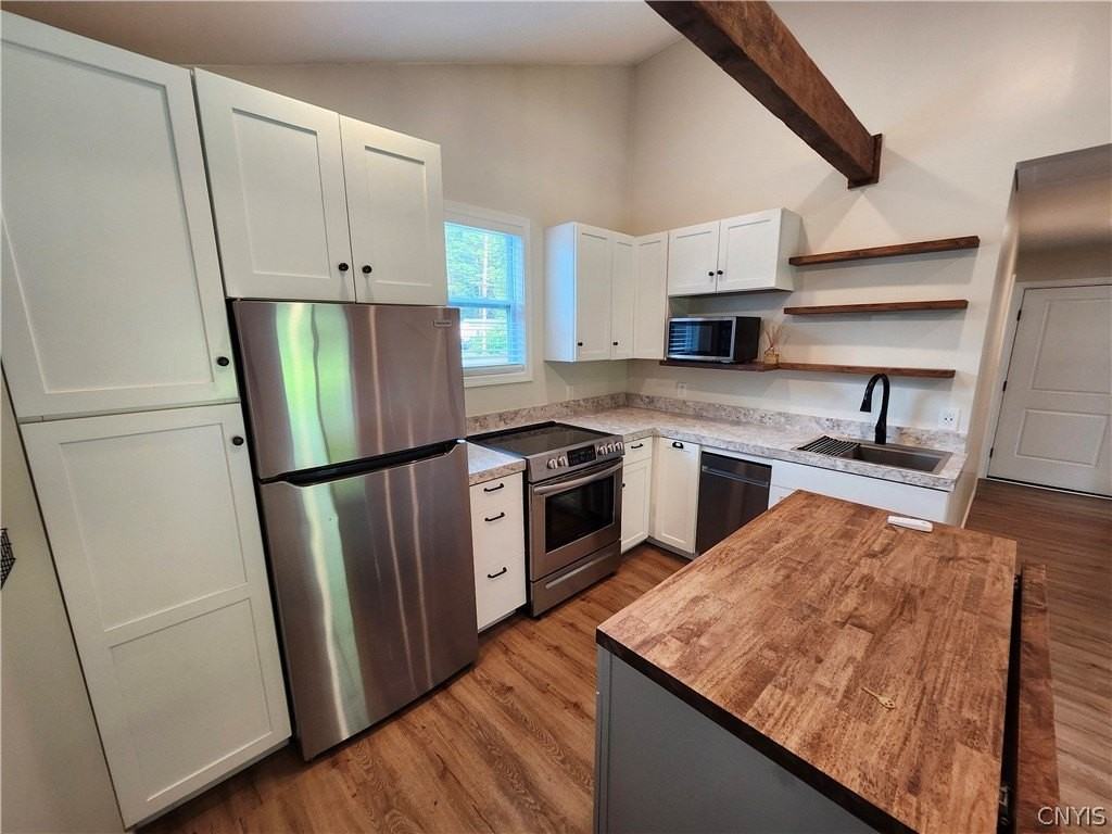 1582B Chestnut Ridge Rd - Photo 3 of 16