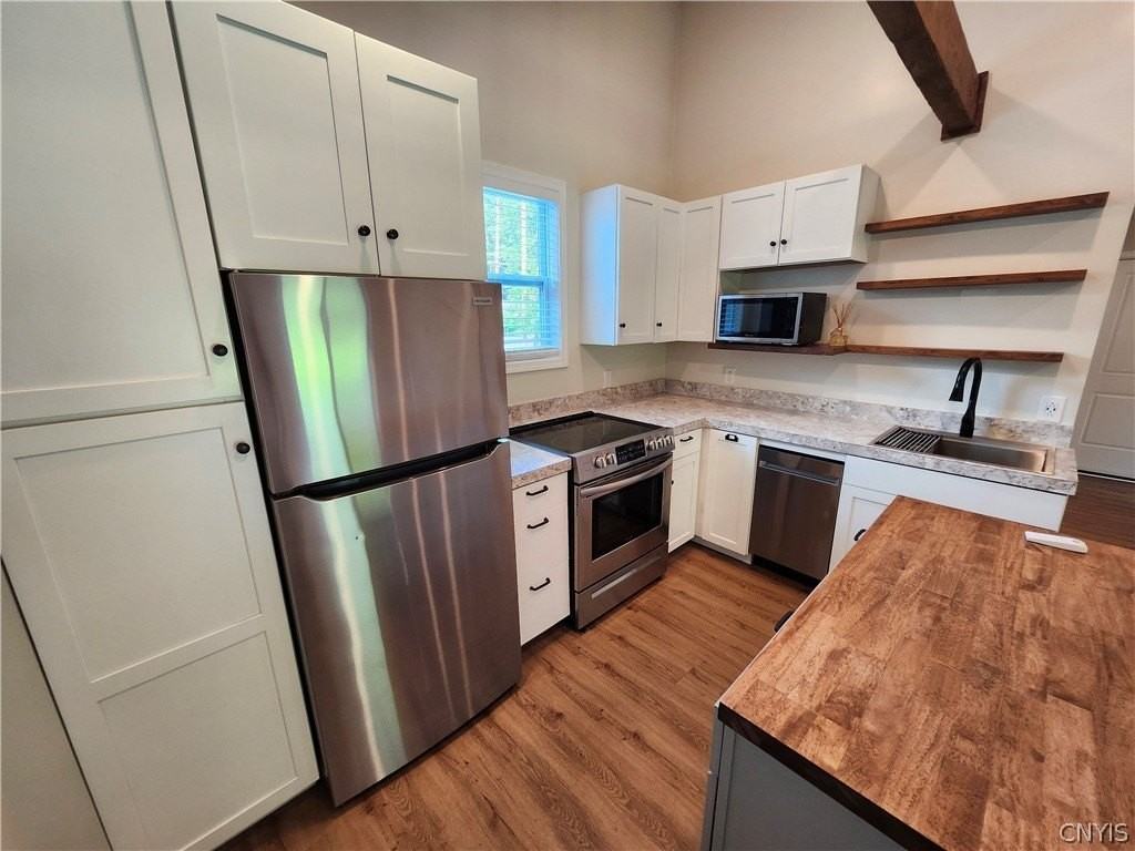 1582B Chestnut Ridge Rd - Photo 4 of 16