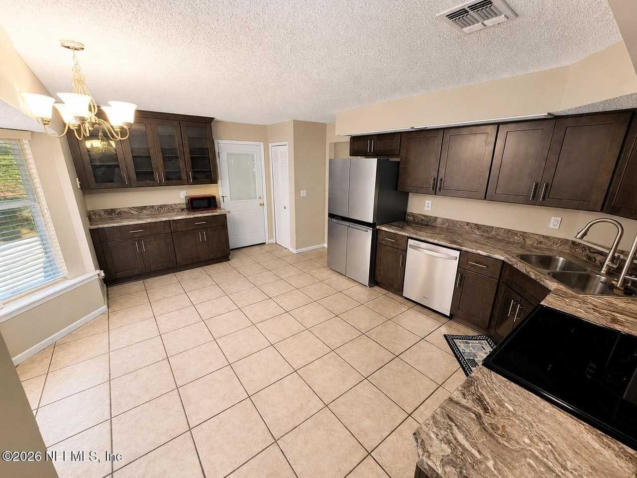 7855 Collins Ridge Blvd - Photo 5 of 7
