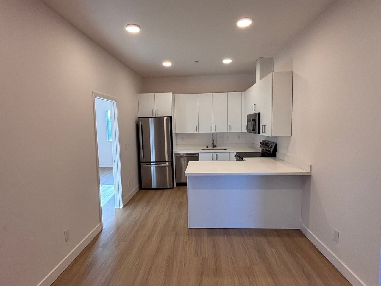 Newly Renovated Apartments | Pet Friendly | Gated Parking - Photo 2 of 26