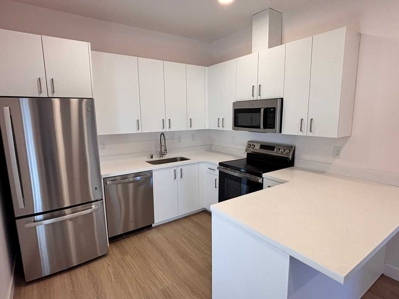 Newly Renovated Apartments | Pet Friendly | Gated Parking - Photo 3 of 26