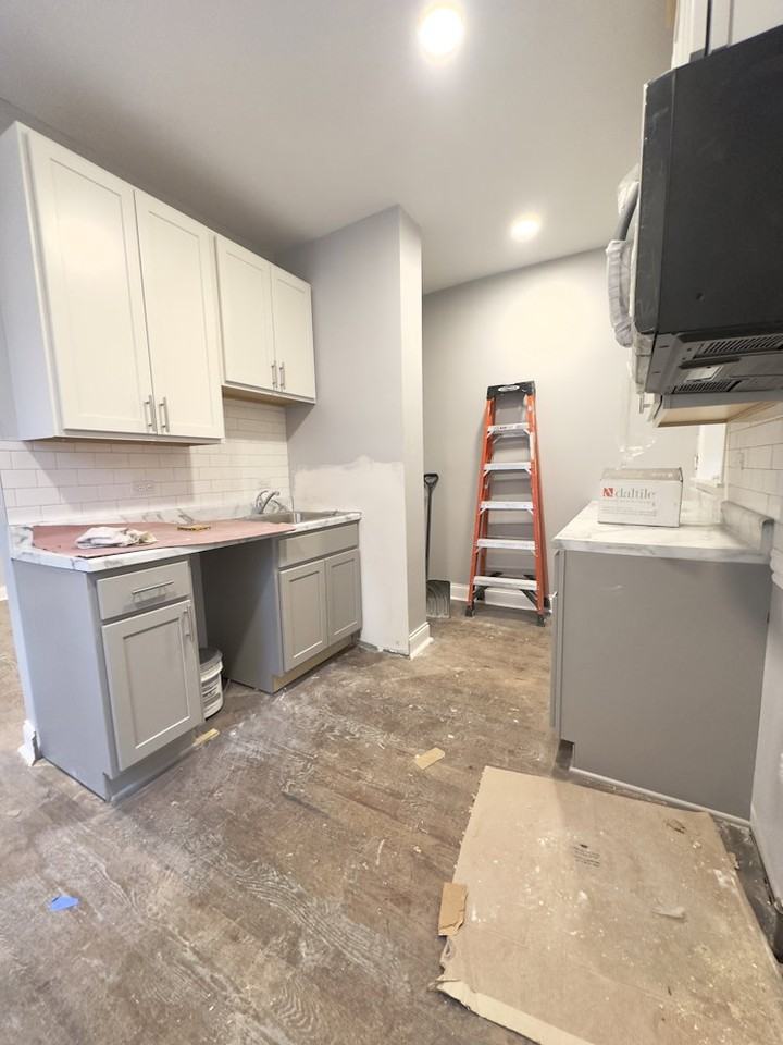 6257 W Rosemont Ave ## 1 - Photo 4 of 8