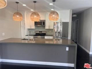 7865 Bleriot Ave - Photo 7 of 8